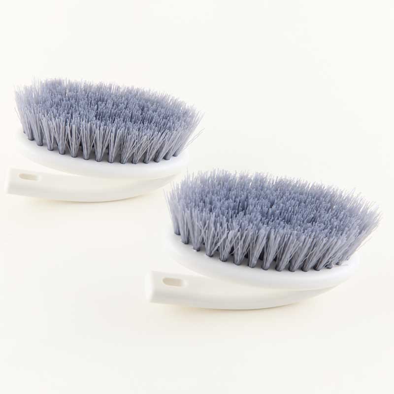 Iron-shaped cleaning brush with handle